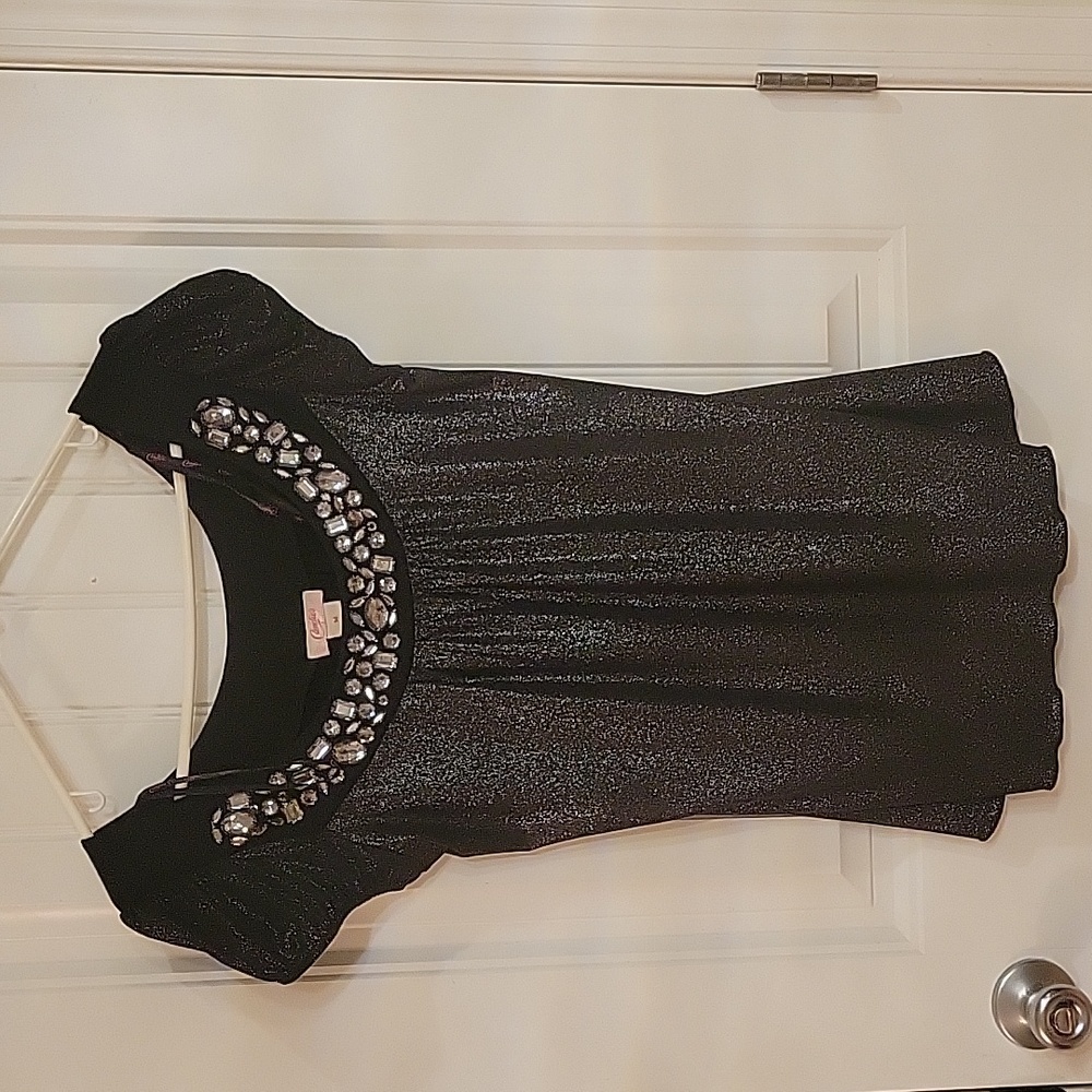 Candie's Black with Rhinestones Neck Line. Never been worn. Sz M.